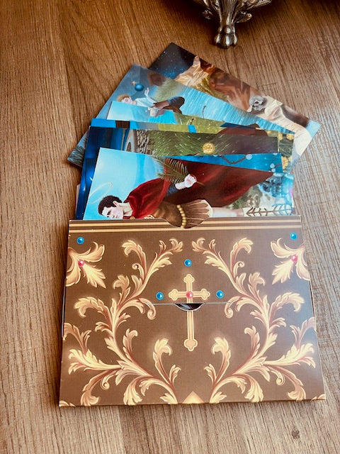 Box Set Limited Edition of the Mystical Tarot of the Saints. Premium gift containing gold edges linen tarot cards, altar cloth, art prints