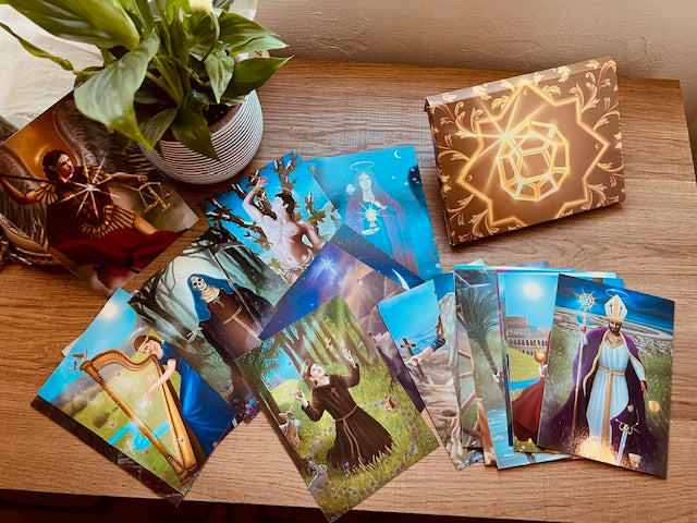 Box Set Limited Edition of the Mystical Tarot of the Saints. Premium gift containing  gold edges linen tarot cards, altar cloth, art prints